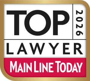 Logo badge for 'Top Lawyer 2026' by Main Line Today, with a gold rounded border and a red bottom stripe reading 'Main Line Today'.